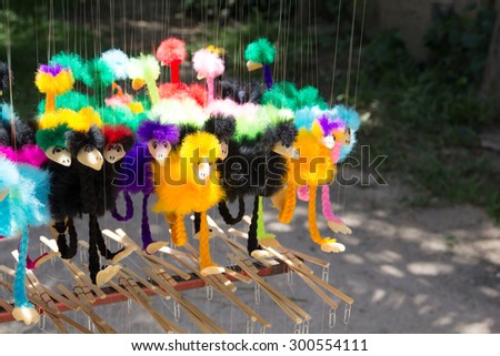 colorfull ostric puppet string