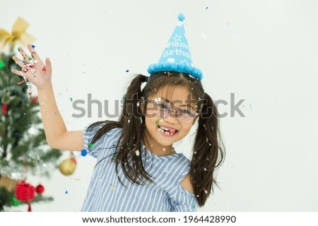 Cute Asian little girl playing in the nursery school with happy and smile