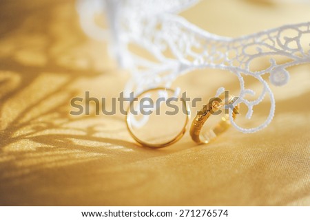 Beautiful wedding ring with diamonds in gold \
with a mask