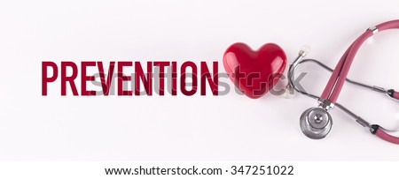 PREVENTION concept with stethoscope and heart shape