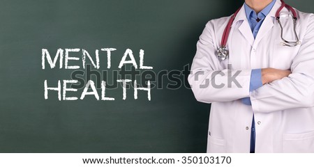 Doctor Standing front of Blackboard written MENTAL HEALTH