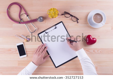 Health Concept: Doctor working on Desk