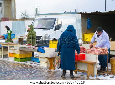 KALININGRAD, RUSSIA - FEBRUARY 8, 2015: meat trade at the Sunday fair in Kaliningrad. A local farmer welcome the imposition of economic sanctions by the EU