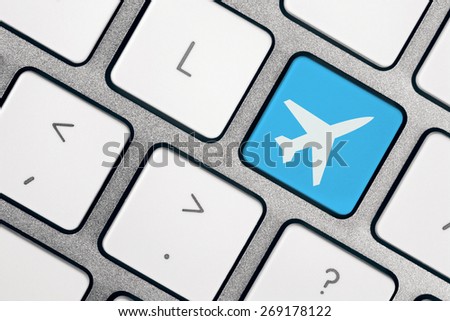 Computer Keyboard with plane - book your flights online