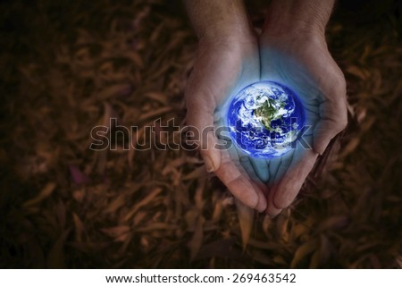 Earth in hands \
Some components of this montage are provided courtesy of NASA, and have been found at http://visibleearth.nasa.gov.