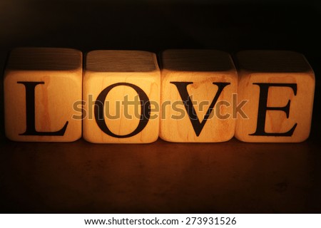 Building Blocks in the Dark with Light spelling out love