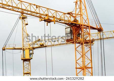 Yellow building tower crane