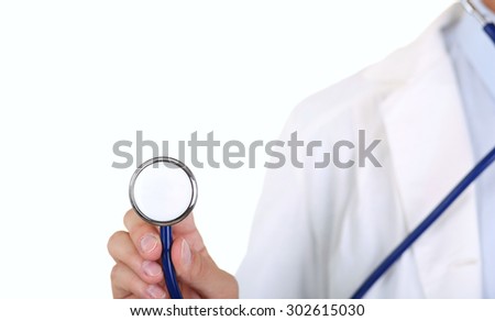 Male medicine doctor hand holding stethoscope head closeup in front of his chest. Medical help or insurance concept. Physician is ready to examine patient and help. Treatment and patient care concept