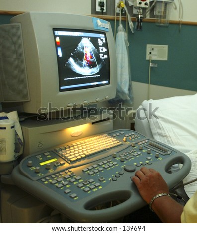 Ultrasound Machine and Technician\'s Hands