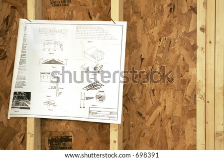 Roofing construction plans nailed to studs
