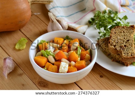 Salad with baked pumpkin, white beans and feta