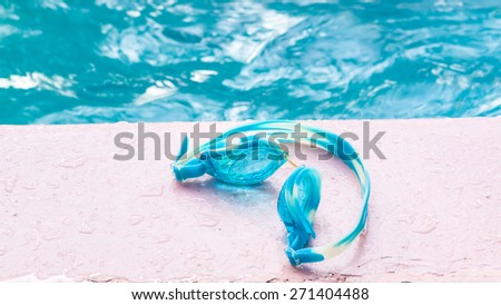 water glasses blue on floor for swimming
