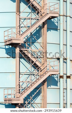 old iron stairs go up on silos