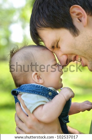 Father with his son. Focus on babies face