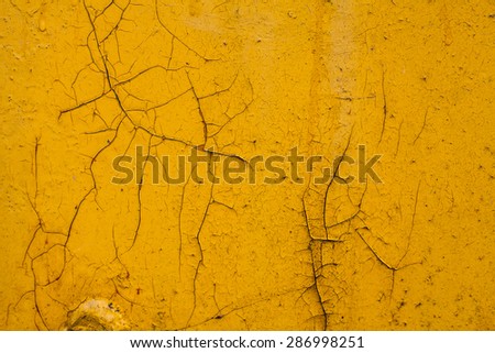 texture of cracked yellow paint on metal 7