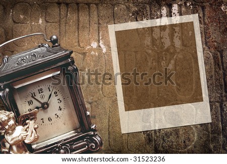 Old stone background with retro clock and frame