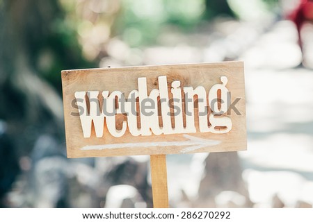 Wedding decor. Wooden plaque with the inscription Wedding.  Wedding decorations, Wooden plaque with the inscription Wedding. rustic style