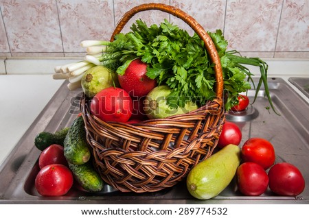 Mix of vegetables in basket on steel table