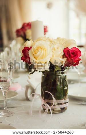 Bouquet of roses on the table