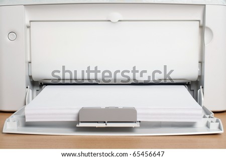 The laser printer with a paper ready for printing