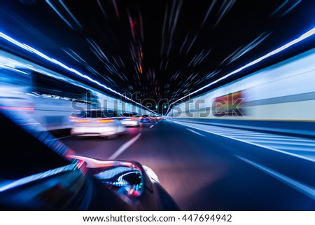 Blurry chromatic color tunnel car traffic motion blur. Motion blur visualizies the speed and dynamics.