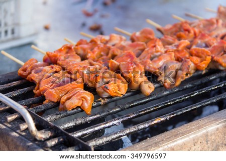 Grilled Chicken Wings, chicken liver as Thai style at street food in Thailand.