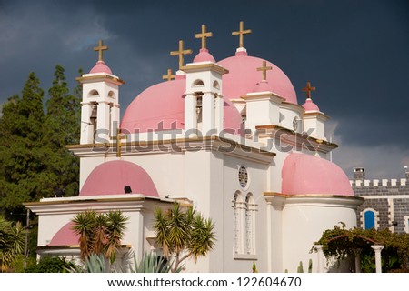 Crosses and pink domes decorate the roof of the Greek Orthodox Church of the Seven Apostles near Capernaum on the Sea of Galilee in northern Israel.