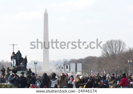 WASHINGTON, DC - JAN. 20: A record crowd of 1.8 million people fill the National Mall to watch the historic 2009 inauguration of Barack Obama, America\'s first African American president.