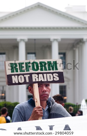 WASHINGTON, DC - MAY 1: Immigrants and their supporters march to the White House on International Workers\' Day, to call for legal reforms and an end to workplace raids May 1, 2009 in Washington, DC.