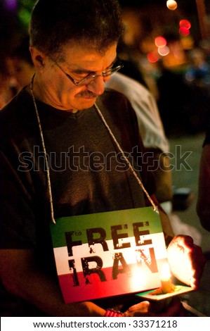 WASHINGTON, DC - JULY 2: Activists hold a candle light vigil at Washington, DC\'s Dupont Circle park on July 2, 2009 to protest the outcome of Iranian elections in which Mahmoud Ahmadinejad claimed victory.