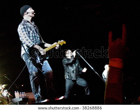 LANDOVER, MD - SEPT 29: The Edge, guitarist of the Irish rock band U2, performs live with vocalist Bono at FedEx Field to a packed house at the 90,000 seat stadium during the band\'s \