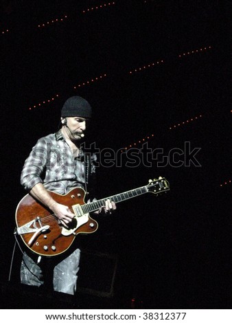 LANDOVER, MD - SEPT 29, 2009: The Edge, guitarist of the Irish rock band U2, performs live at FedEx Field to a packed house at the 90,000 seat stadium during the band\'s \