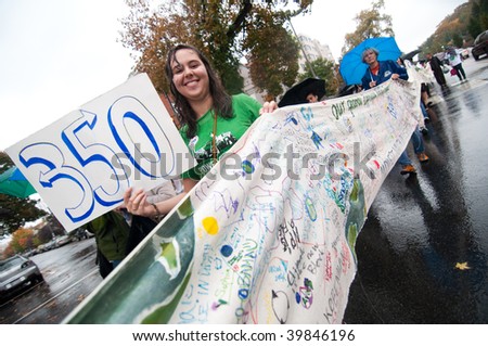 WASHINGTON, DC - OCTOBER 24: Environmental activists call for cutting carbon emissions to 350 parts per million during the International Day of Climate Action on October 24, 2009 in Washington, DC