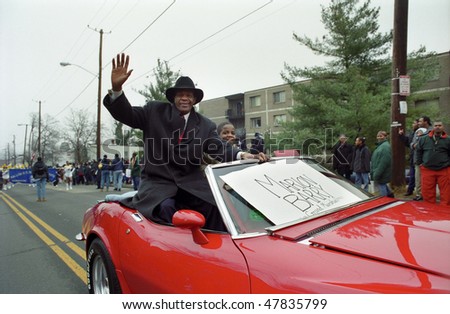 WASHINGTON, DC - JANUARY 15: Marion Barry rides in a convertible red Corvette as the grand marshall of the Martin Luther King Day Parade on Jan. 15, 2001 in Washington, DC.