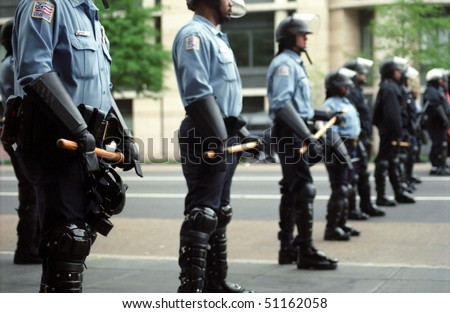 WASHINGTON, DC - APRIL 16: Riot police are positioned to confront protesters during World Bank and IMF meetings on April 16, 2000 in Washington, D.C.