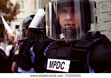 Police in full riot gear Riot Police Gear. Police in full riot gear