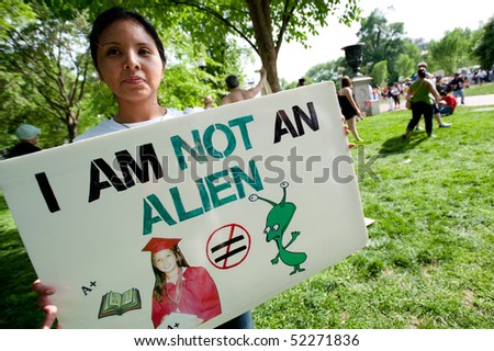 WASHINGTON, DC - MAY 1: Immigration reform activists protest on May 1, 2010 at the White House in Washington, DC.