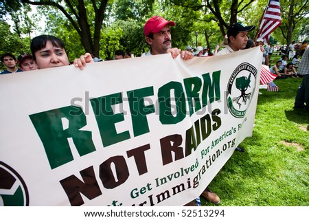 WASHINGTON, DC - MAY 1: Immigration reform activists protest on May 1, 2010 at the White House on in Washington, DC.