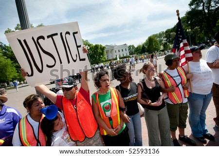 WASHINGTON, DC - MAY 1: Immigration reform activists protest at the White House on May 1, 2010 in Washington, DC.