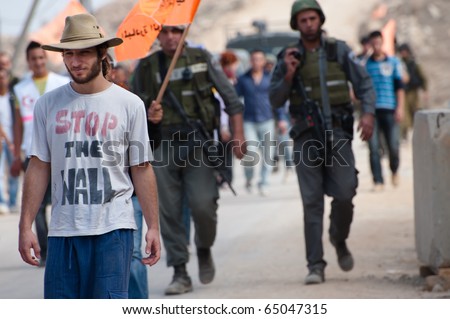 AL-WALAJA, - NOVEMBER 13: An Israeli activist in a \