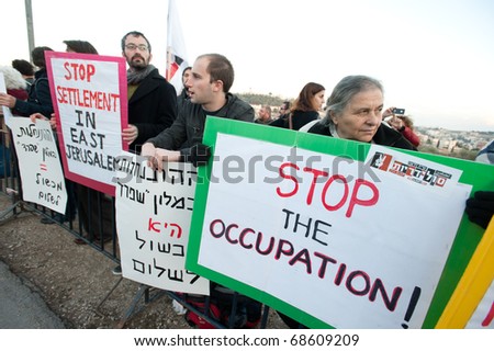EAST JERUSALEM - JANUARY 9: Activists protest the demolition of buildings in the East Jerusalem neighborhood of Sheikh Jarrah to make way for Jewish settlements on Jan. 9, 2011 in East Jerusalem.