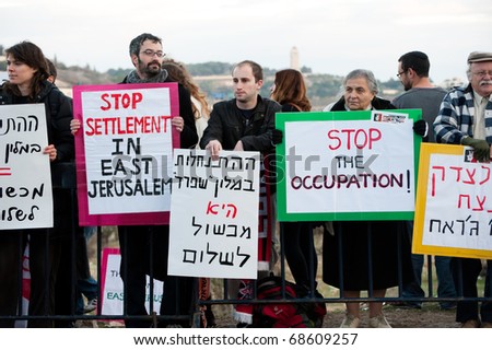 EAST JERUSALEM - JANUARY 9: Activists protest the demolition of buildings in the East Jerusalem neighborhood of Sheikh Jarrah to make way for Jewish settlements on Jan. 9, 2011 in East Jerusalem.