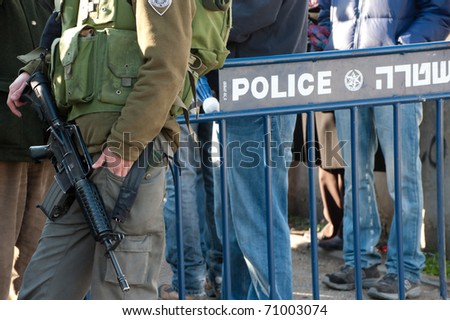 EAST JERUSALEM - FEBRUARY 11: Israeli police set up checkpoints to guard Jewish settlers who\'ve seized Palestinian homes in the Sheikh Jarrah neighborhood of East Jerusalem on Feb. 11, 2011.