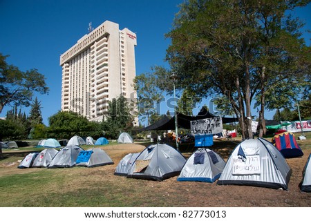 JERUSALEM - AUGUST 11: A tent city pitched near a high-rise building as part of Israel\'s nationwide \