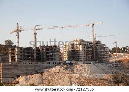 GILO, OCCUPIED PALESTINIAN TERRITORIES - OCTOBER 26: Construction continues in the Israeli settlement of Gilo between Jerusalem and the West Bank town of Bethlehem on Oct. 26, 2011.