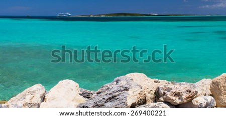 Beautiful caribbean beach with clear blue water. Coco-Cay private beach, Bahamas.