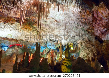 Colorful stalactites and stalagmites in the underground cave