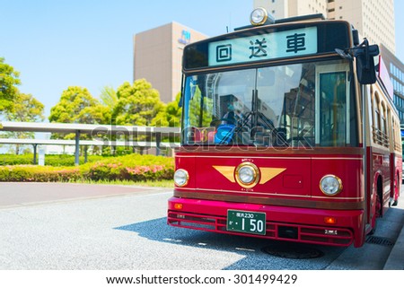 YOKOHAMA CITY, JAPAN - 07 MAY 2013: Red public bus at the bus station. Yokohama downtown, Japan.