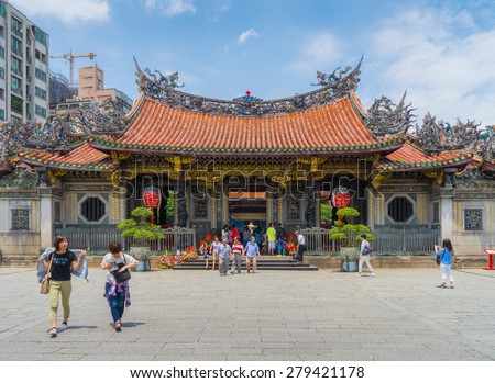 TAIPEI, TAIWAN - May 5, 2015 : Many people including tourist and believers come to Longshan Temple, Taiwan on May 5th, 2015. It is one of the oldest Traditional Temple in Taipei