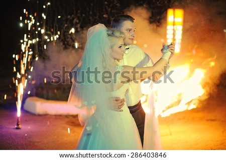 Wedding couple on fire show